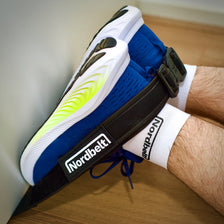 Nordbelt around sports shoes, ready for the first curl